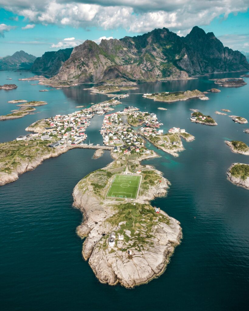 pexels-photo-1559846-1559846 Stunning aerial shot of Henningsvær village and surrounding islands in Lofoten, Norway.