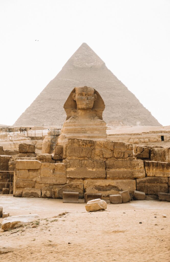 pexels-photo-3185480-3185480 Iconic view of the Sphinx with the Pyramid of Khafre in Giza, Egypt.